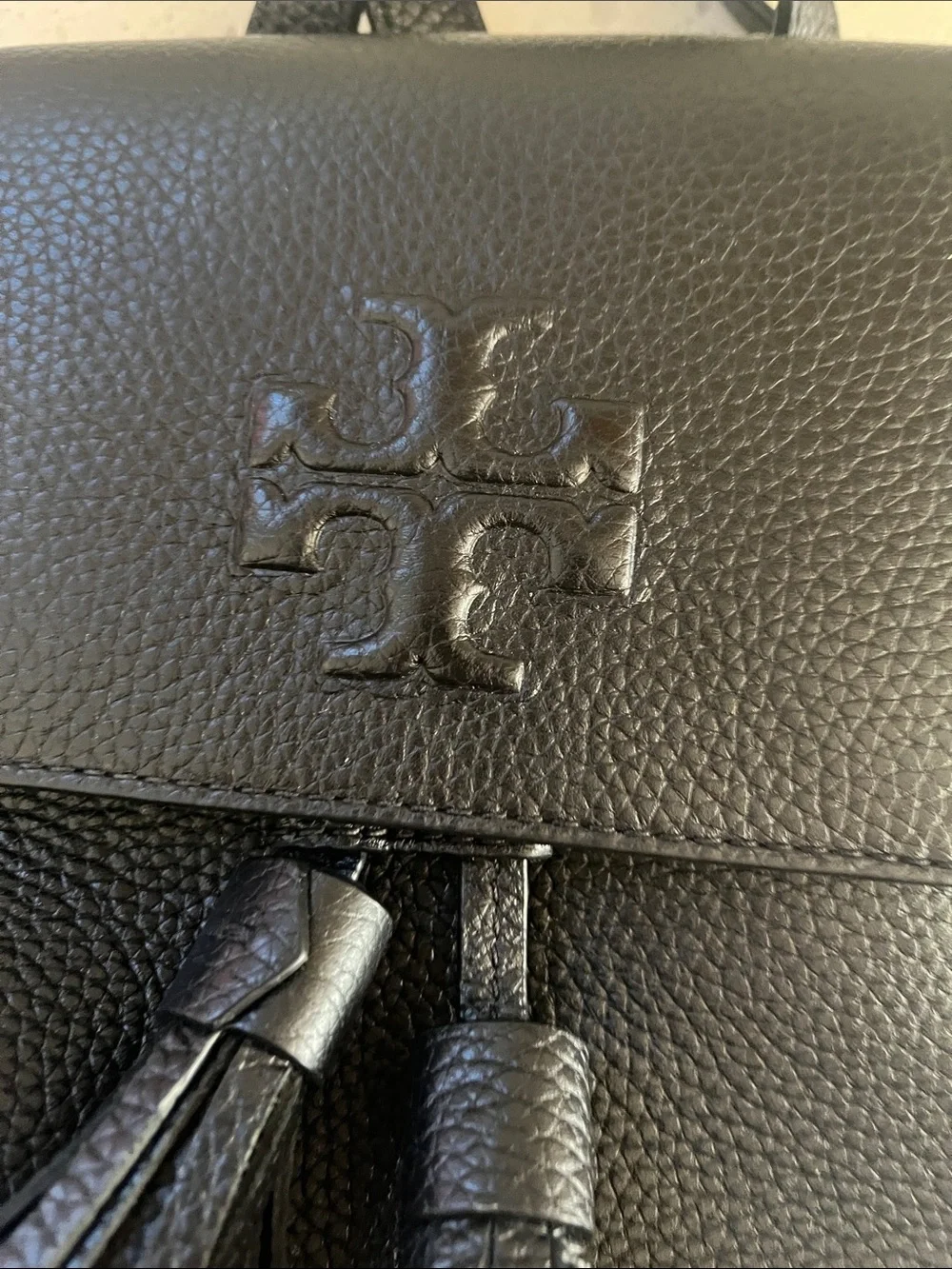 Tory Burch Black Pebbled Leather Tassel Backpack thea mini